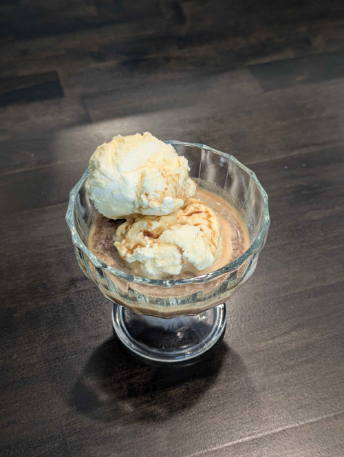 Top down photo of an affogato in a glass sundae cup.